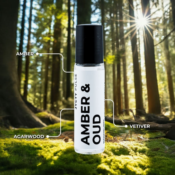 Roll-on bottle labeled 'Amber & Oud' in a forest setting