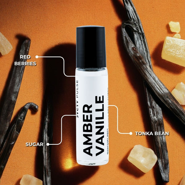 Amber Vanille perfume bottle with vanilla beans and sugar on an orange background