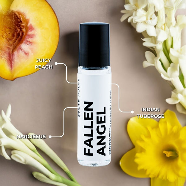 Roll-on bottle labeled 'Fallen Angel' with floral and fruit elements on a neutral background