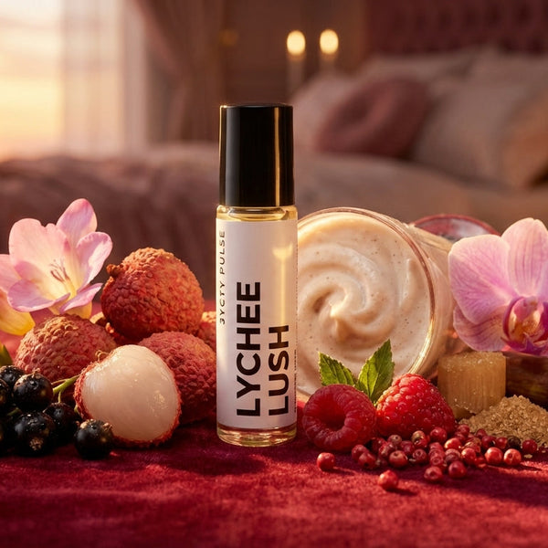 Lychee Lush perfume oil on a red surface with lychees and flowers