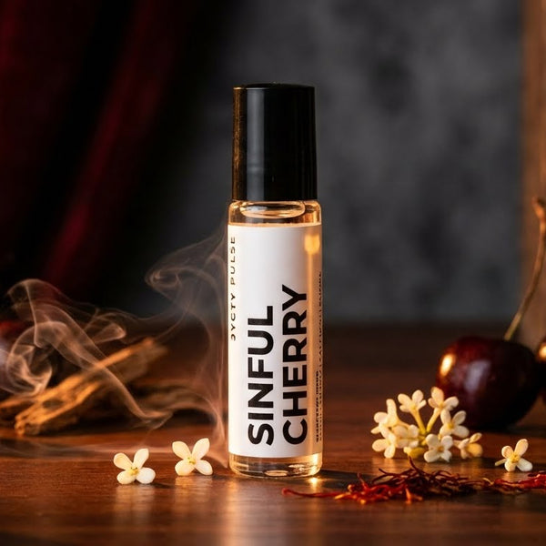 Sinful Cherry Vegan Perfume oil by JYCTY bottle with cherries and flowers around